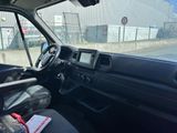 a view of the inside of a vehicle from the driver ' s seat
