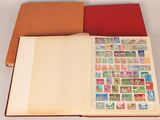 an open book with stamps on it sitting on a table