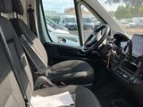 the interior of a van with the driver ' s seat folded down