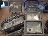 many different types of flood lights on a table