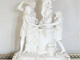 a statue that is sitting on top of a table
