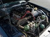 a car engine that is sitting in the trunk of a car