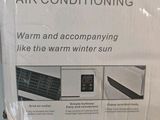 packaging of a wall mounted air conditioner sitting on top of a white counter
