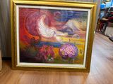 painting of a white dove in a golden frame on a wooden floor