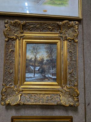 une photo d'un tableau accroché au mur