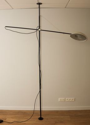 an image of a lamp that is on a wooden floor
