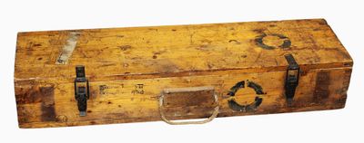 an old wooden box with metal handles on a white background