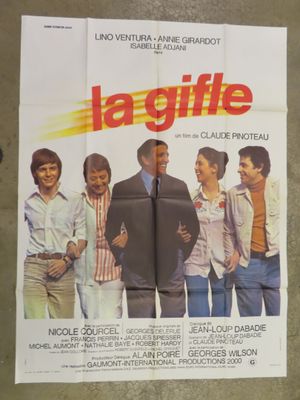 the poster for the movie lagiffe is hanging on the wall