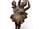 bronze statue of a ballerina and a child on a pedestal