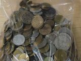a bag full of coins sitting on a table