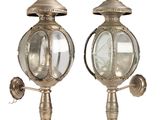 pair of antique brass wall lights with glass globes
