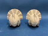 pair of white ceramic turkey figurines on black bases