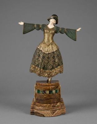 an image of a statue of a woman in a dress on a pedestal