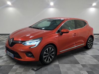 a red renault c - cross parked on a checkered floor