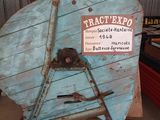 a large blue boat sitting on a pallet in a warehouse