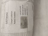 a close up of a roll of fabric with a label on it