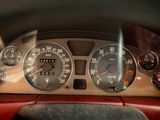 a close up of a car dashboard with various gauges