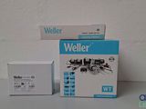 deux boîtes de produits Weller posées sur une table