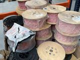 many spools in a box in a warehouse