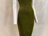 a green knit dress on a mannequin mannequin mannequin mannequin mannequin mannequin mannequin mannequin manne