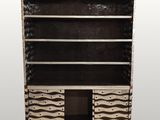 a black and white wooden bookcase with drawers and drawers