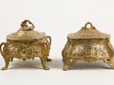pair of gold plated sugar dishes with lids and handles