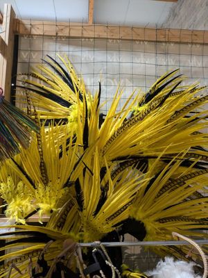 a vase with a bunch of yellow flowers in it