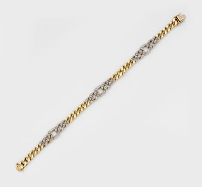 a gold and diamond bracelet
