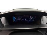 the dashboard of a car with a digital display in the center