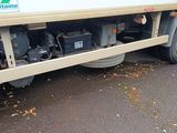 an image of a truck that has a bunch of batteries in the back