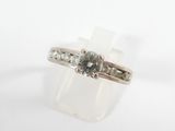 a picture of a diamond ring on a white background