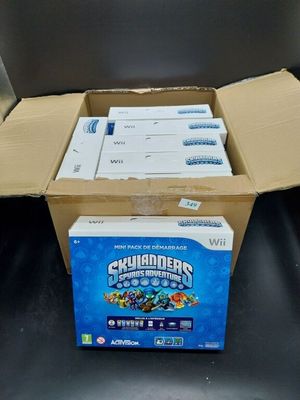 a box of nintendo wii games sitting on a table