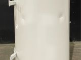 an image of a large white tank sitting on top of a floor