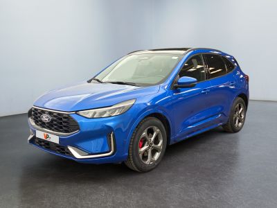 a blue suv parked in a room with a black floor