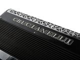a close up of a black accordion on a white background
