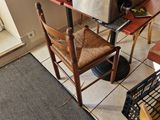 a small table with a microwave on top of it