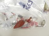 many different types of fishing lures in a bag