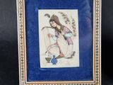 an old picture of a woman with a watering hose in a blue frame