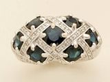 an image of a ring with blue and white diamonds on it