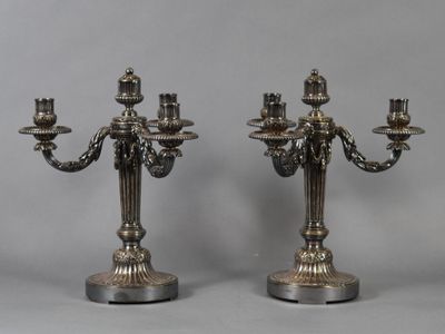 pair of antique silver plated candelabs on stands