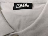 a close up of a white shirt with a label on it