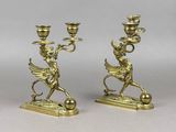 pair of antique brass candlesticks with cherenshes and angels