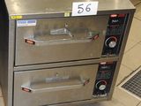deux fours à pizza superposés dans une cuisine