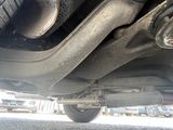 a close up of a car ' s exhaust pipe and exhaust pipe