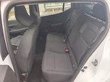 the back seats of a car are empty and the passenger seat is empty