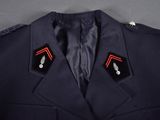 an image of a military uniform with two red arrows on the lapel