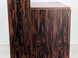 two pieces of wood are stacked on top of each other