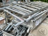 a pile of metal equipment that is sitting on the ground