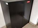 an image of a black metal cabinet in a room