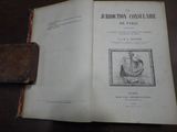 un livre ouvert sur lequel figure l'image d'un bateau